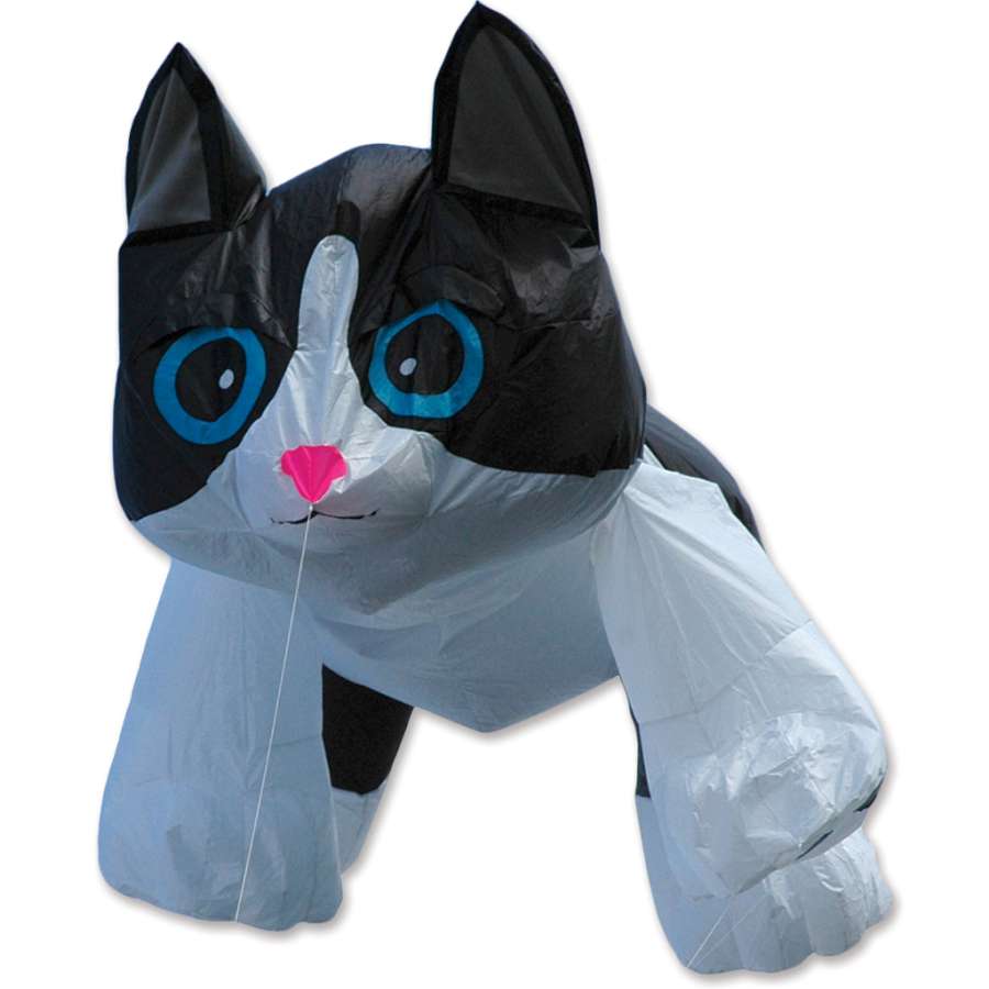4 ft. Black & White Kitten Line Device kite soaring in a bright blue sky, showcasing its playful kitten design with vibrant colors.