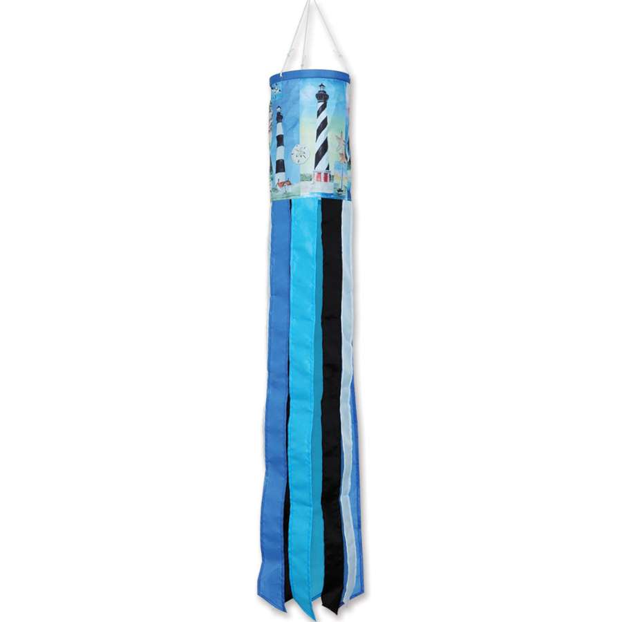 5 Lighthouses windsock displaying colorful lighthouse designs, swaying gently in a garden setting against a clear blue sky.