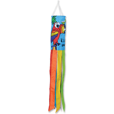 5 O'Clock Somewhere windsock featuring a colorful embroidered applique design, swaying gracefully in the wind in an outdoor garden.