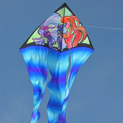 6.5 ft. Flo-Tail Delta kite with long flowing tails flying in a clear blue sky, perfect for outdoor recreational activities.