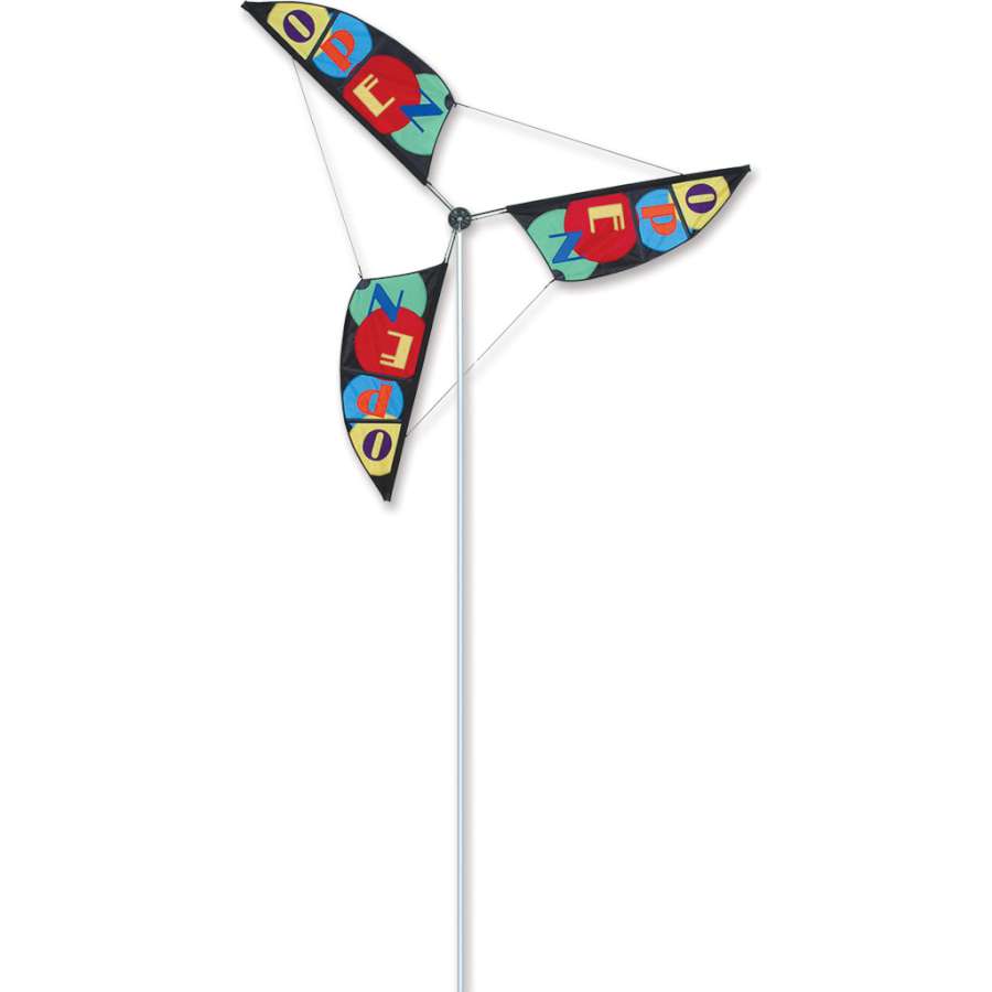 6.5 ft. Wind Generator featuring colorful blades rotating on a 10.5 ft. aluminum mast against a clear sky, perfect for outdoor decoration.