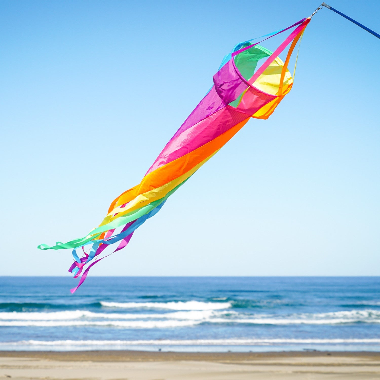 60" Fiesta Spinsock in vibrant colors, spinning elegantly in the breeze, designed to enhance outdoor decor.