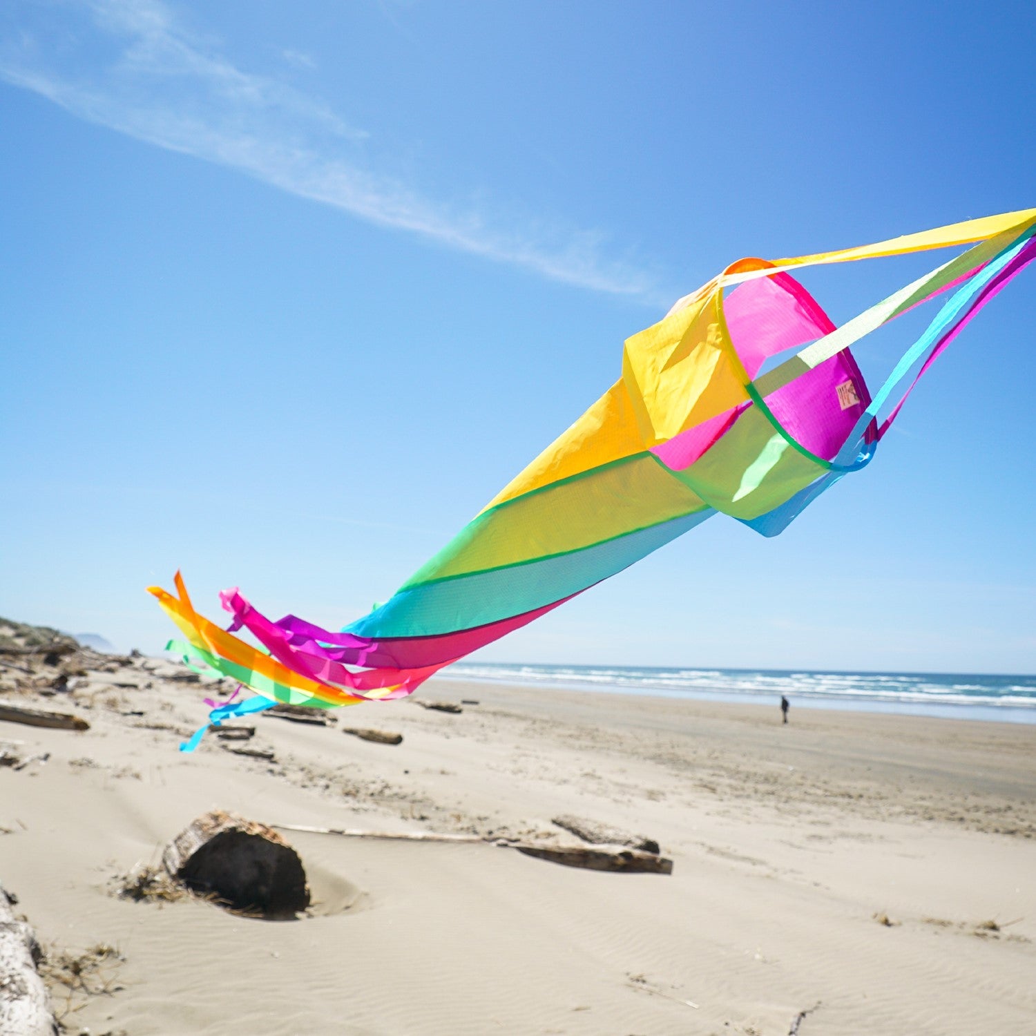 60" Fiesta Spinsock in vibrant colors, spinning elegantly in the breeze, designed to enhance outdoor decor.