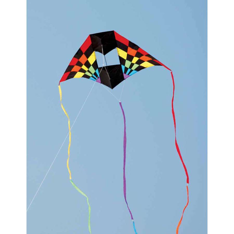 7.5 ft. Box Delta Kite - Rainbow Ray flying high against a clear blue sky, showcasing its colorful design and box structure.