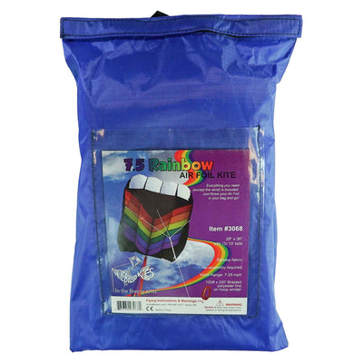 7.5 Rainbow Air Foil kite in flight, showcasing vibrant colors and aerodynamic design against a clear blue sky.