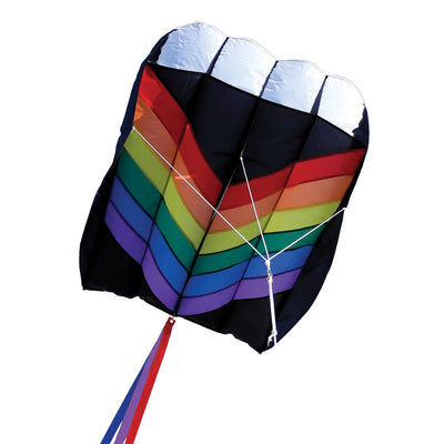 7.5 Rainbow Air Foil kite in flight, showcasing vibrant colors and aerodynamic design against a clear blue sky.