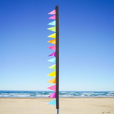 8-foot Fiesta Pennant Banner with 15 colorful triangle pennants hanging in a festive outdoor setting, perfect for celebrations.