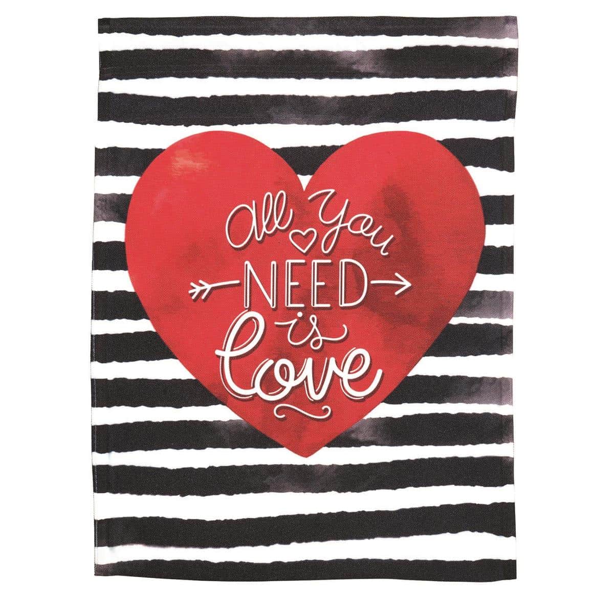 13x18 All You Need Is Love Valentine's printed garden flag showing hand-lettered message 'All You Need Is Love' surrounded by heart accents and subtle florals, displayed on a metal garden stand by a front porch with planters