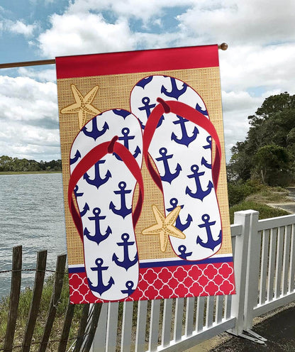 Anchor Flips 29x42 double applique burlap house flag showing layered anchor and flip flops, coastal textures, reinforced stitching, top sleeve fits standard poles