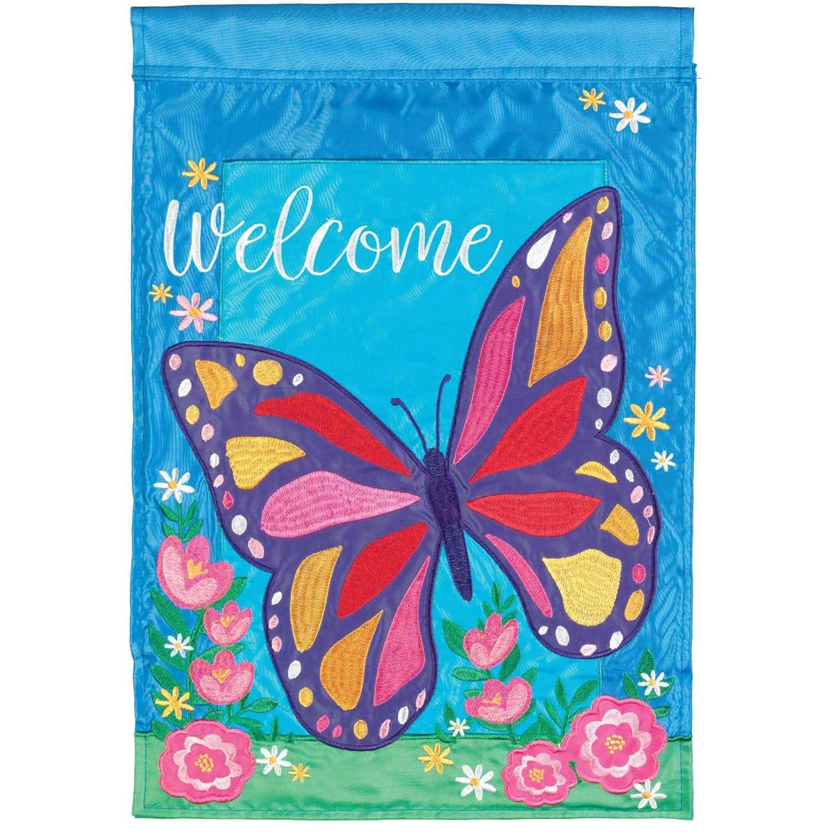 13x18 Butterfly Welcome garden flag with layered double applique flowers and butterflies, two sided readable greeting, shown on a garden stand in a spring yard