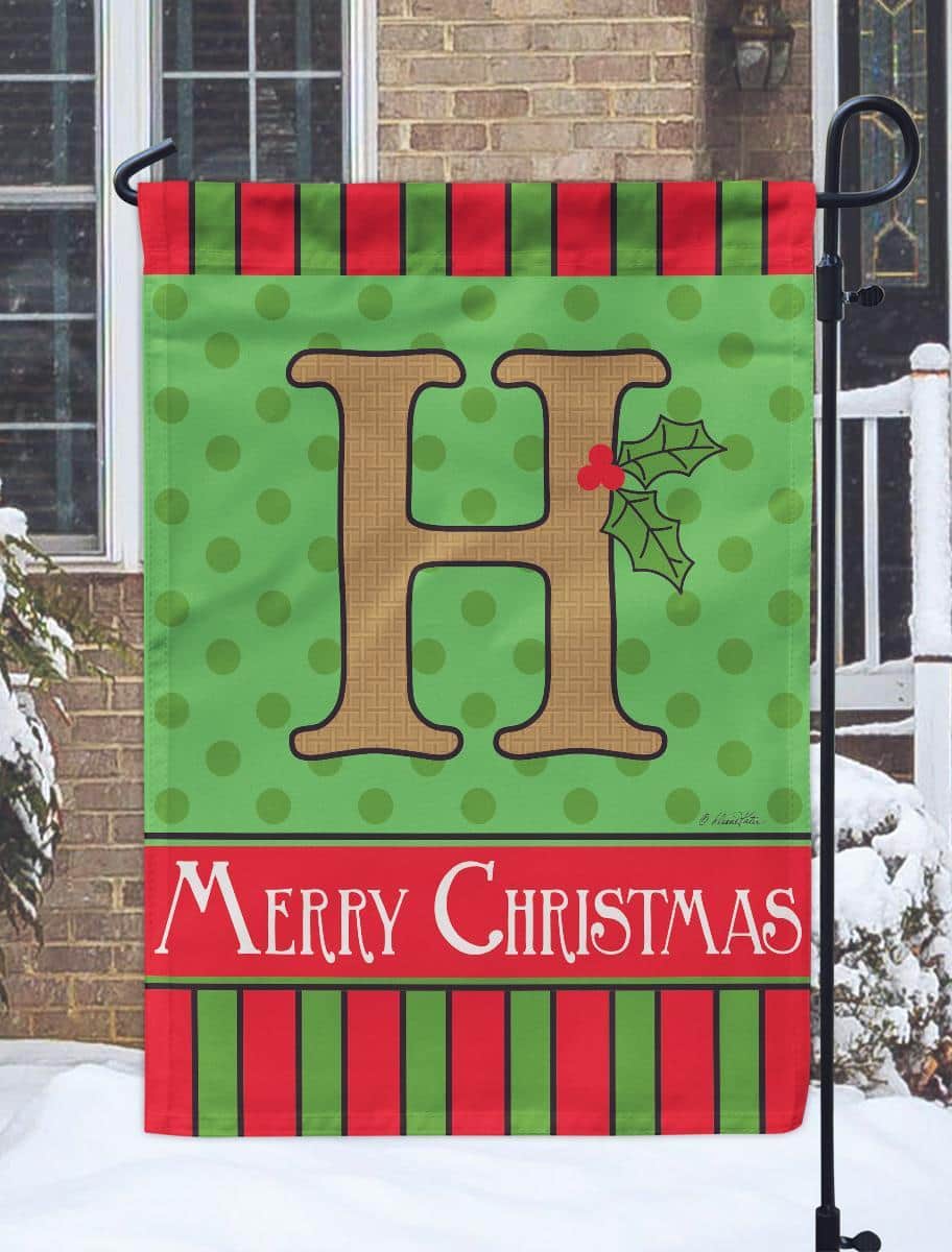13x18 burlap garden flag featuring a Christmas monogram H with double applique holly, plaid accents, and reinforced sleeve for porch or yard display.