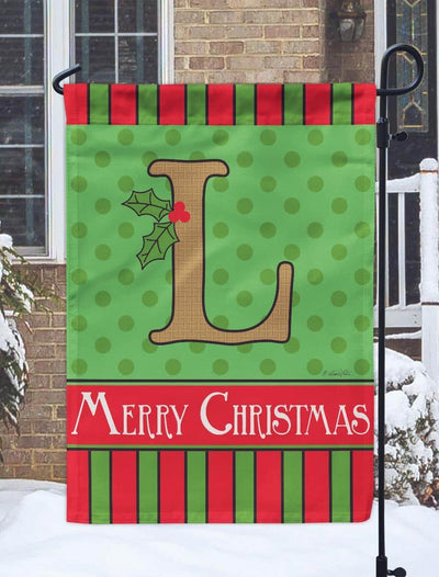 13x18 burlap garden flag featuring a scripted L monogram in double applique, surrounded by an evergreen wreath with holly berries and ribbon accents, designed for porch or yard display.