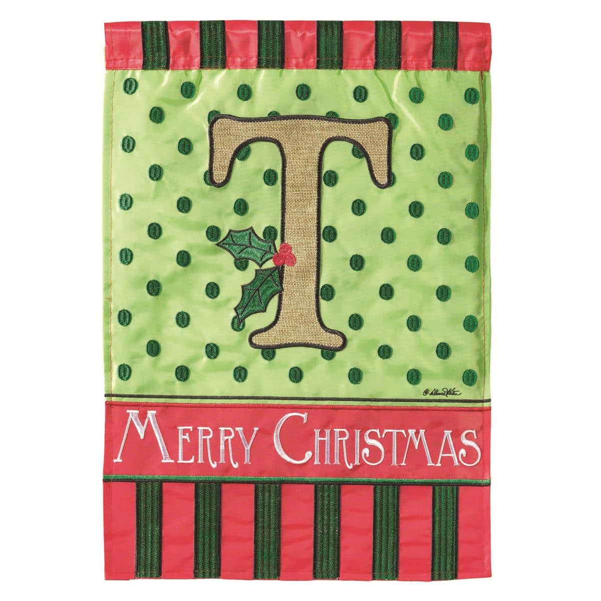 13x18 Christmas Monogram T garden flag with burlap background, double applique monogram T, holly and pine accents, shown on a metal garden flag stand at a festive porch display.