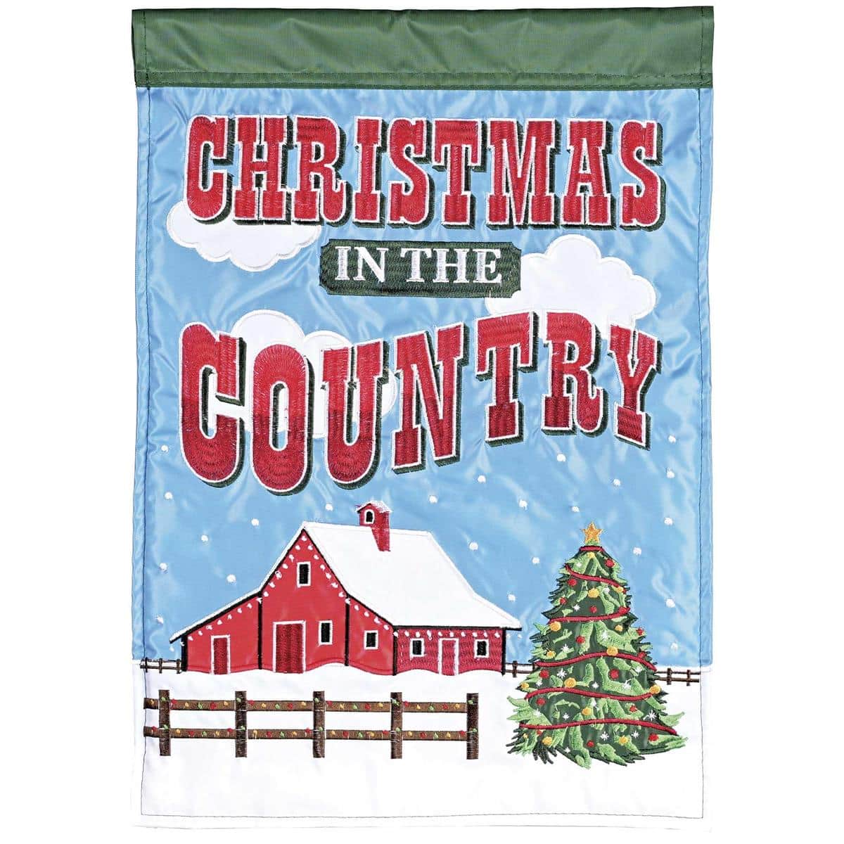 Double applique Christmas Red Barn In Country outdoor flag with snowy red barn, pine trees, and farmhouse details, hanging from a standard garden pole.