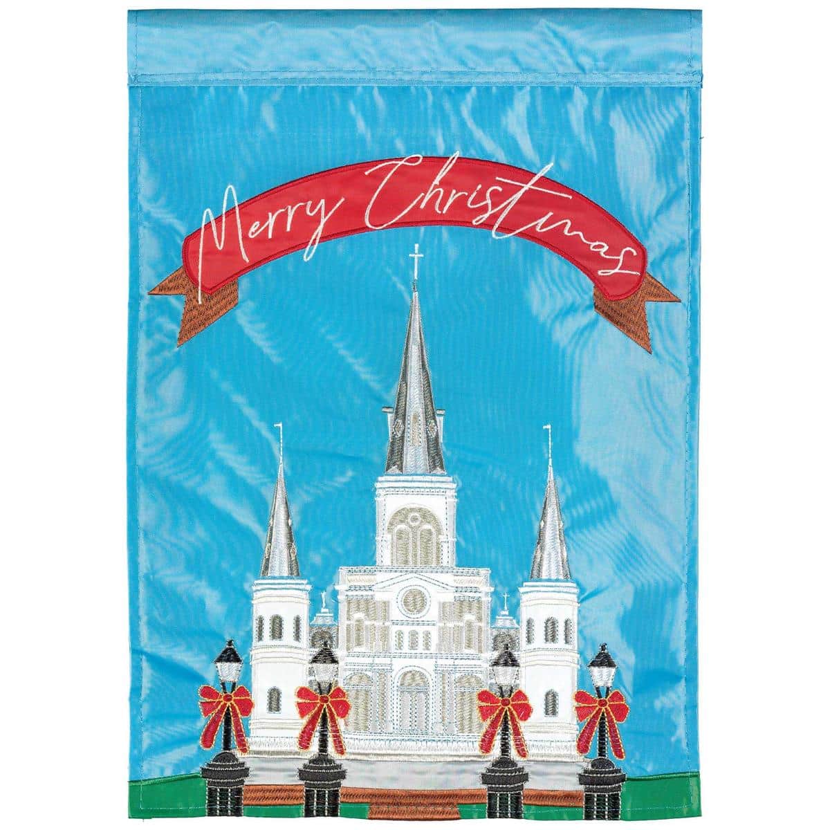 13x18 garden flag showing St Louis Cathedral in a festive Christmas scene with double-applique fabric layers, decorative wreath and lights, suitable for porch or yard holiday display.