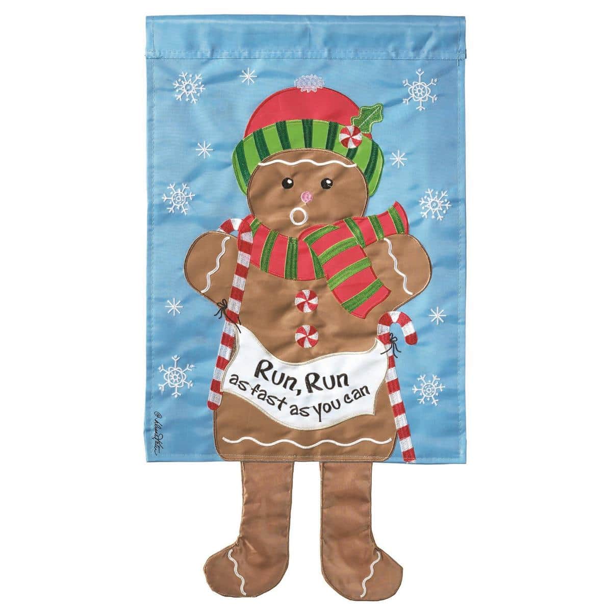 Playful crazy leg gingerbread man Christmas garden flag in 13 by 18 inches with bright icing details and candy accents for porch, yard, mailbox or holiday decoration