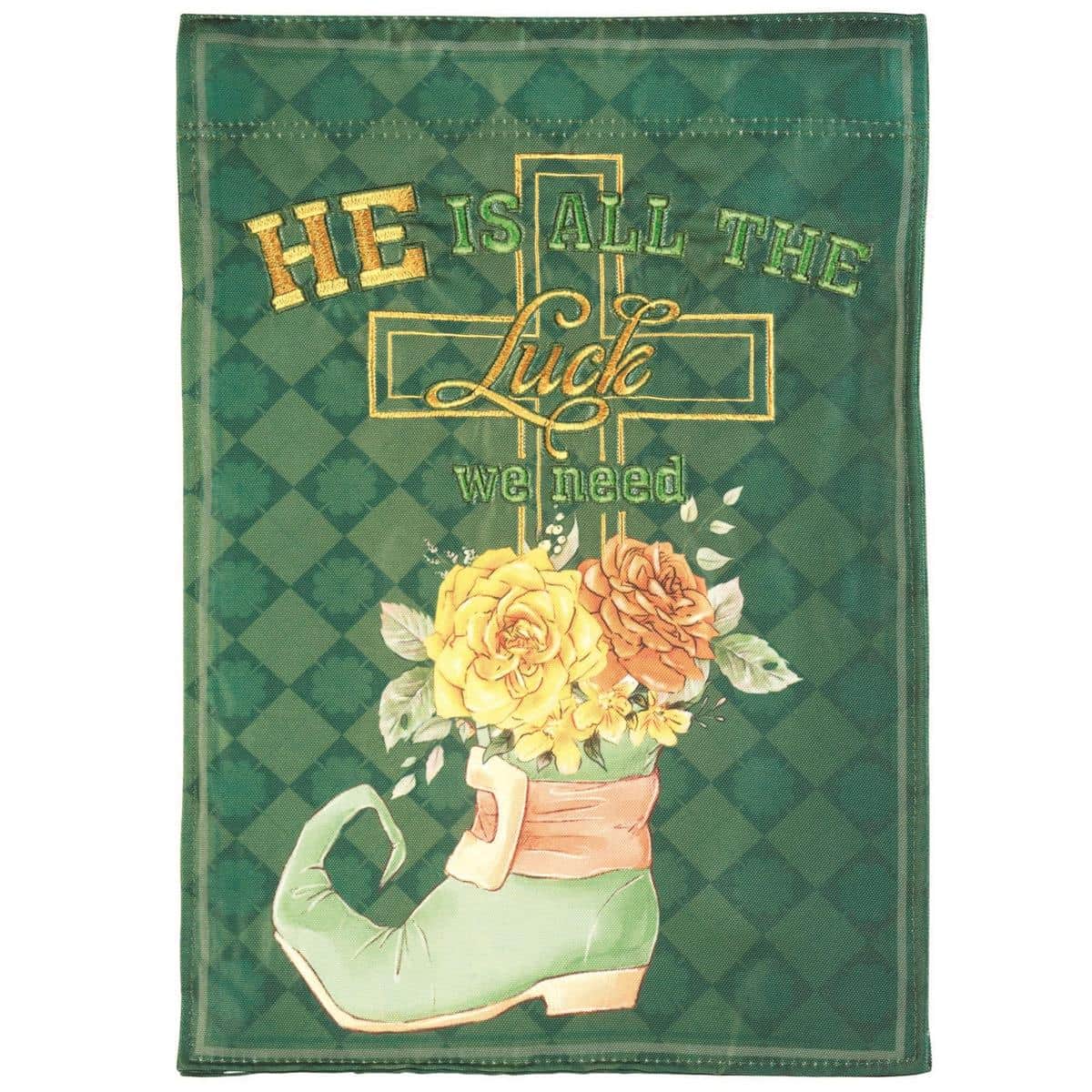 13x18 garden flag with a layered fabric cross and the words "He Is All" in applique, stitched details visible on a neutral background for outdoor display