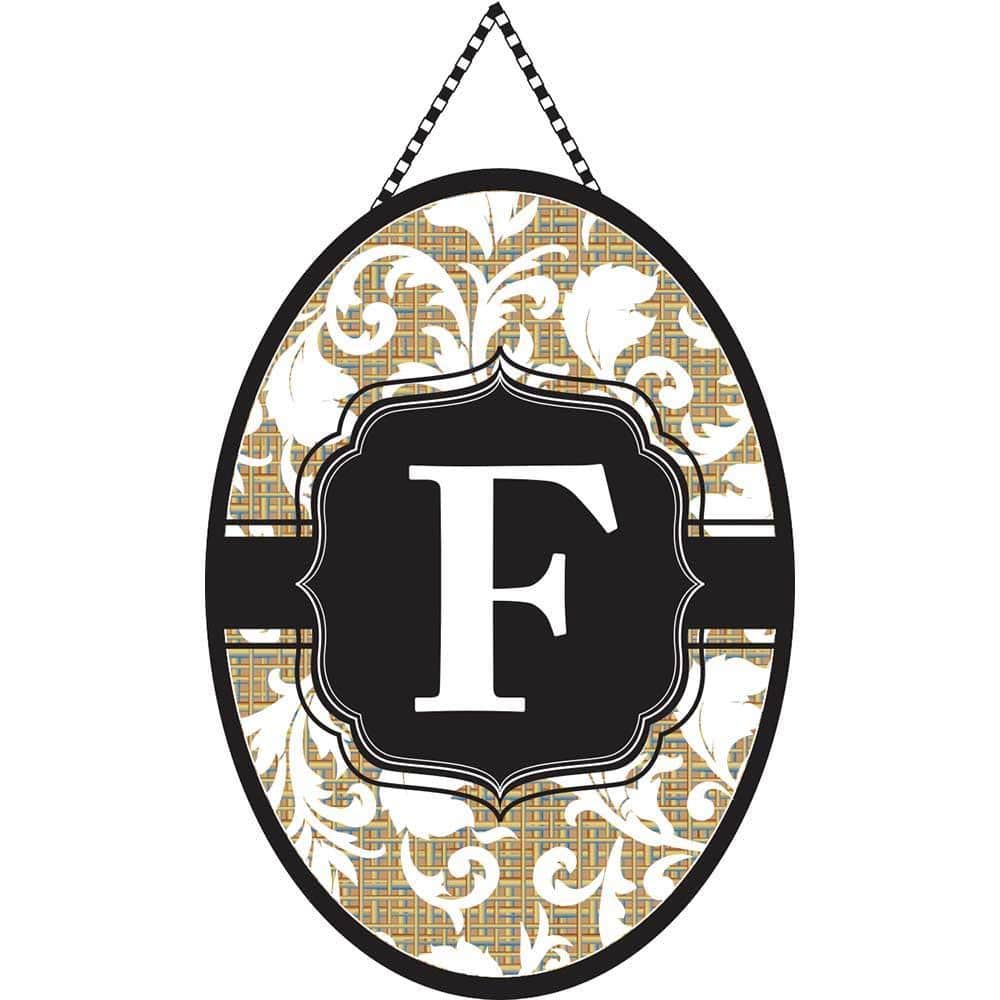 Front door monogram banner featuring the letter F in an elegant script on durable fabric, shown hanging on a styled entry door to illustrate scale and welcome presentation.