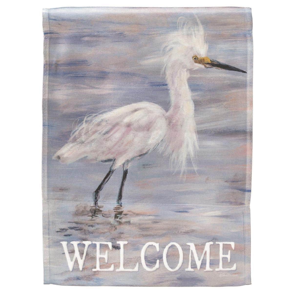 Alt text: 13x18 printed Egret Garden Flag showing a detailed coastal egret motif in beach tones, designed for standard garden flag poles and outdoor porch display.