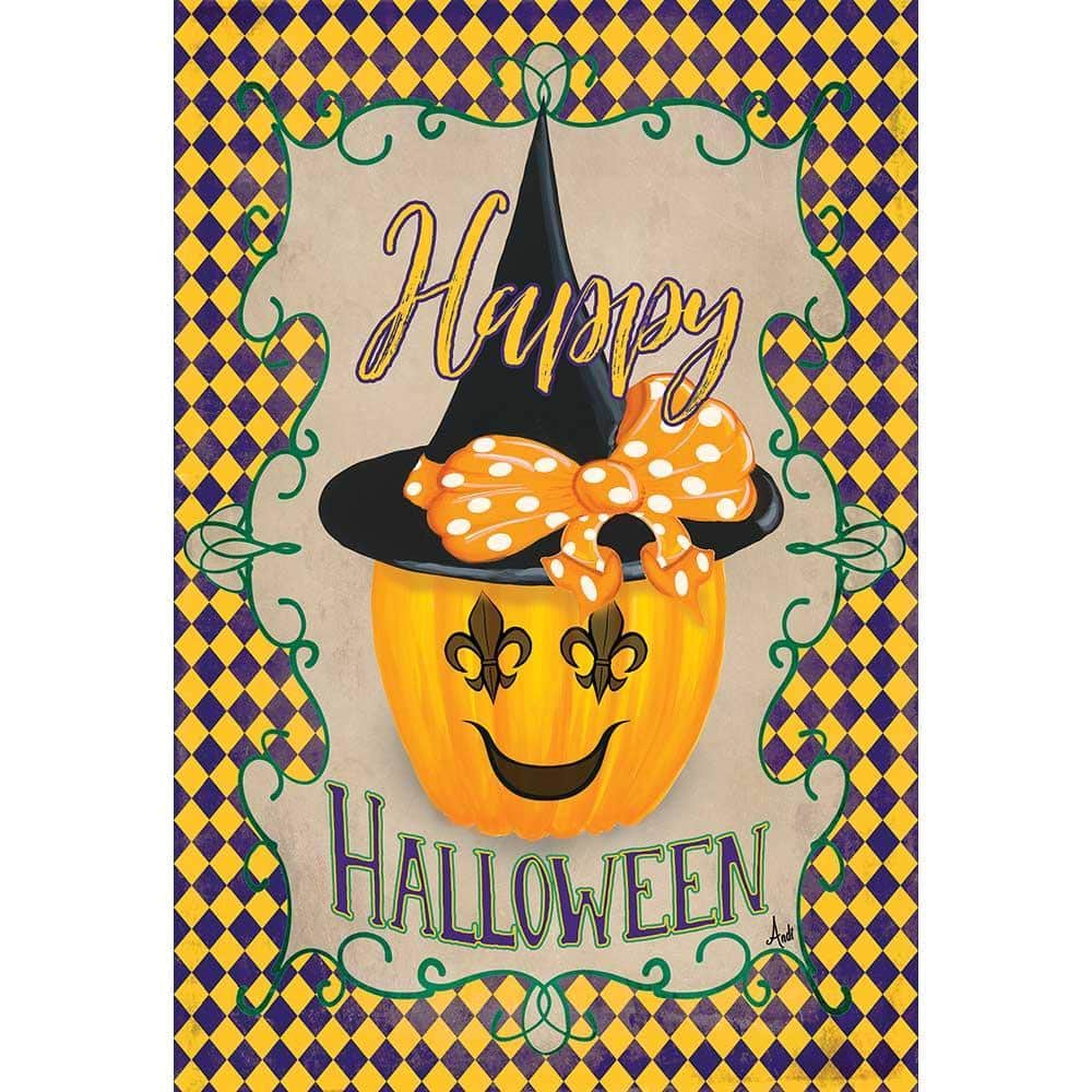 Close-up of 13x18 Halloween garden flag with ornate fleur-de-lis symbol, bold black and orange print, weather-resistant polyester, and top pole sleeve outdoors