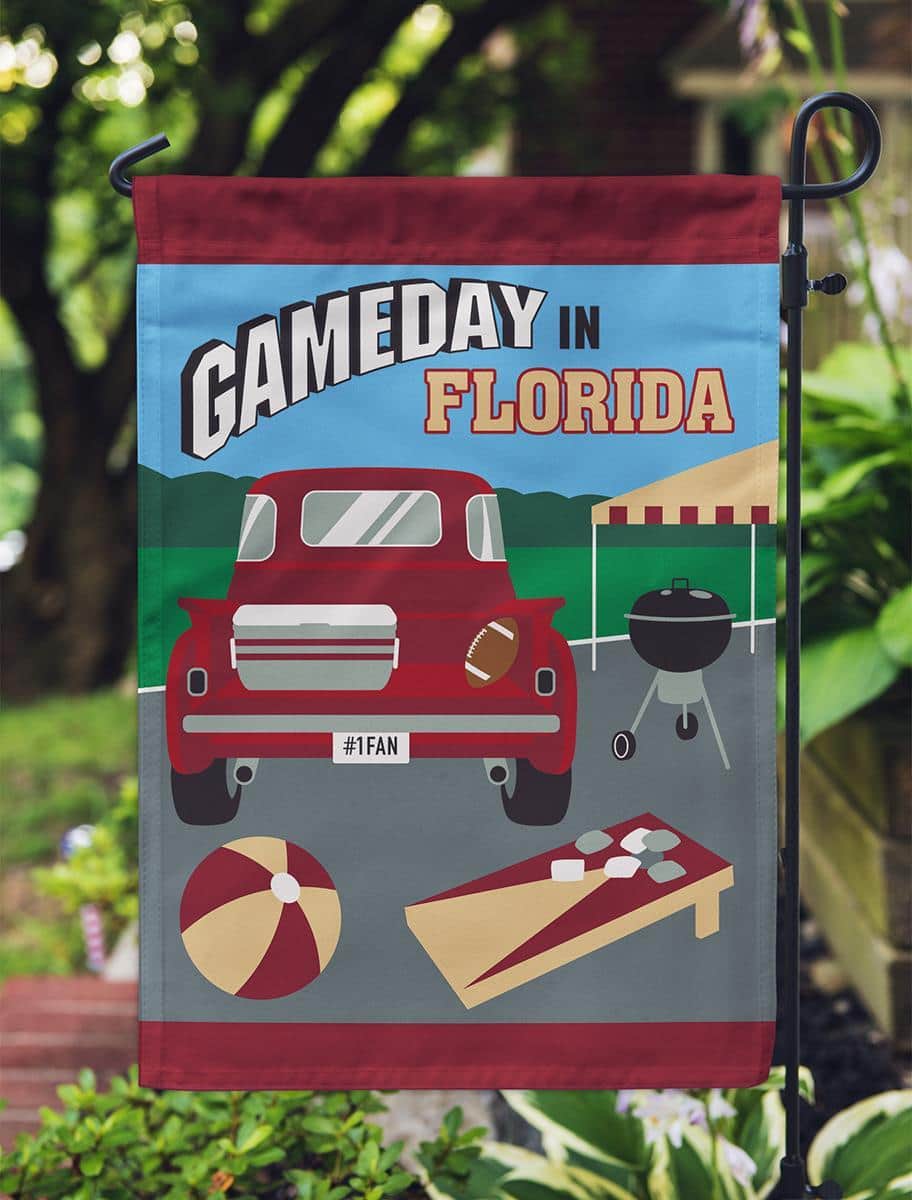 13x18 Gameday Florida garnet and gold garden flag with appliqued design shown on a porch pole, highlighting bold team colors and layered stitch detail.