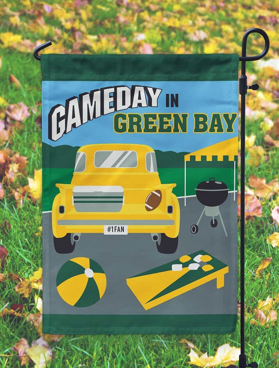 13x18 Green Bay gameday garden flag in green and gold with double-applique team graphics mounted for lawn display.