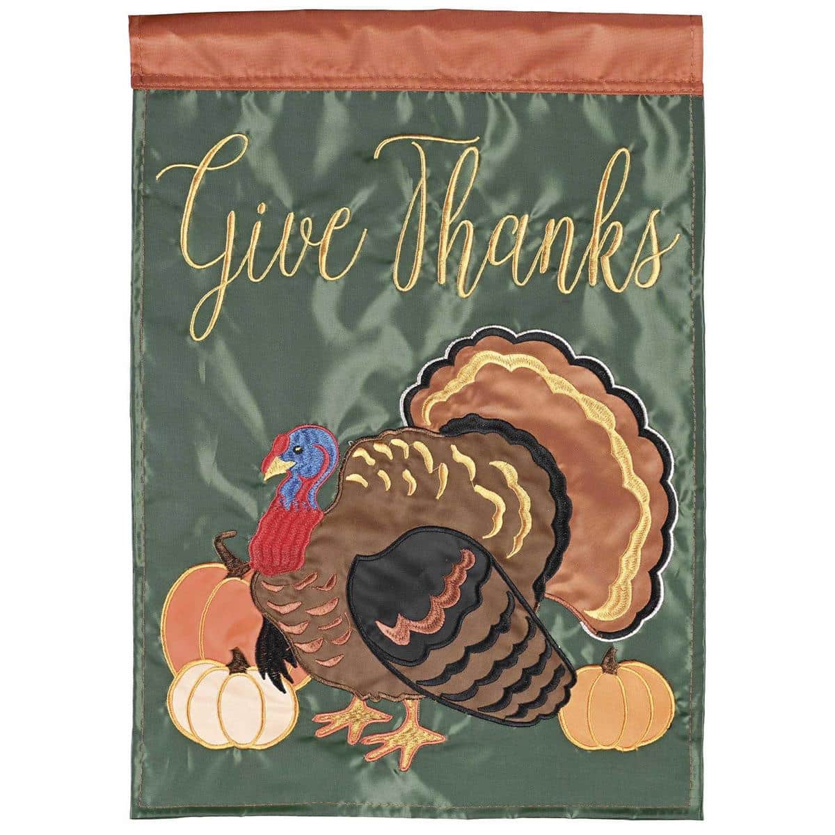 House Give Thanks flag with layered double-applique turkey and pumpkins motif in warm autumn colors, textured stitching details, shown mounted on a porch pole for fall display.