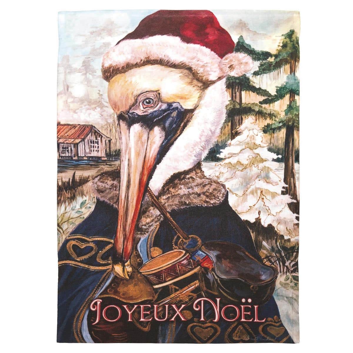 Joyeaux Noel 13x18 garden flag with Merry Christmas script, holly accents and snowflake details displayed on a metal garden stake in a front yard setting.