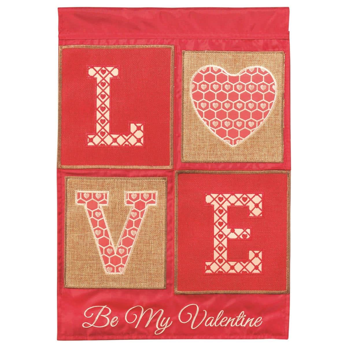 13x18 Love Burlap garden flag showing layered double applique heart design on a burlap background displayed on a porch flag pole.