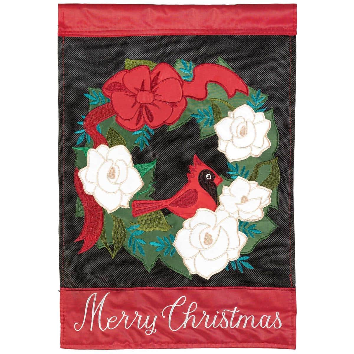 Close-up of Merry Christmas Wreath Banner Flag 29x42 showing double applique stitched greenery, red bow, berry accents, and reinforced pole sleeve on durable holiday fabric.