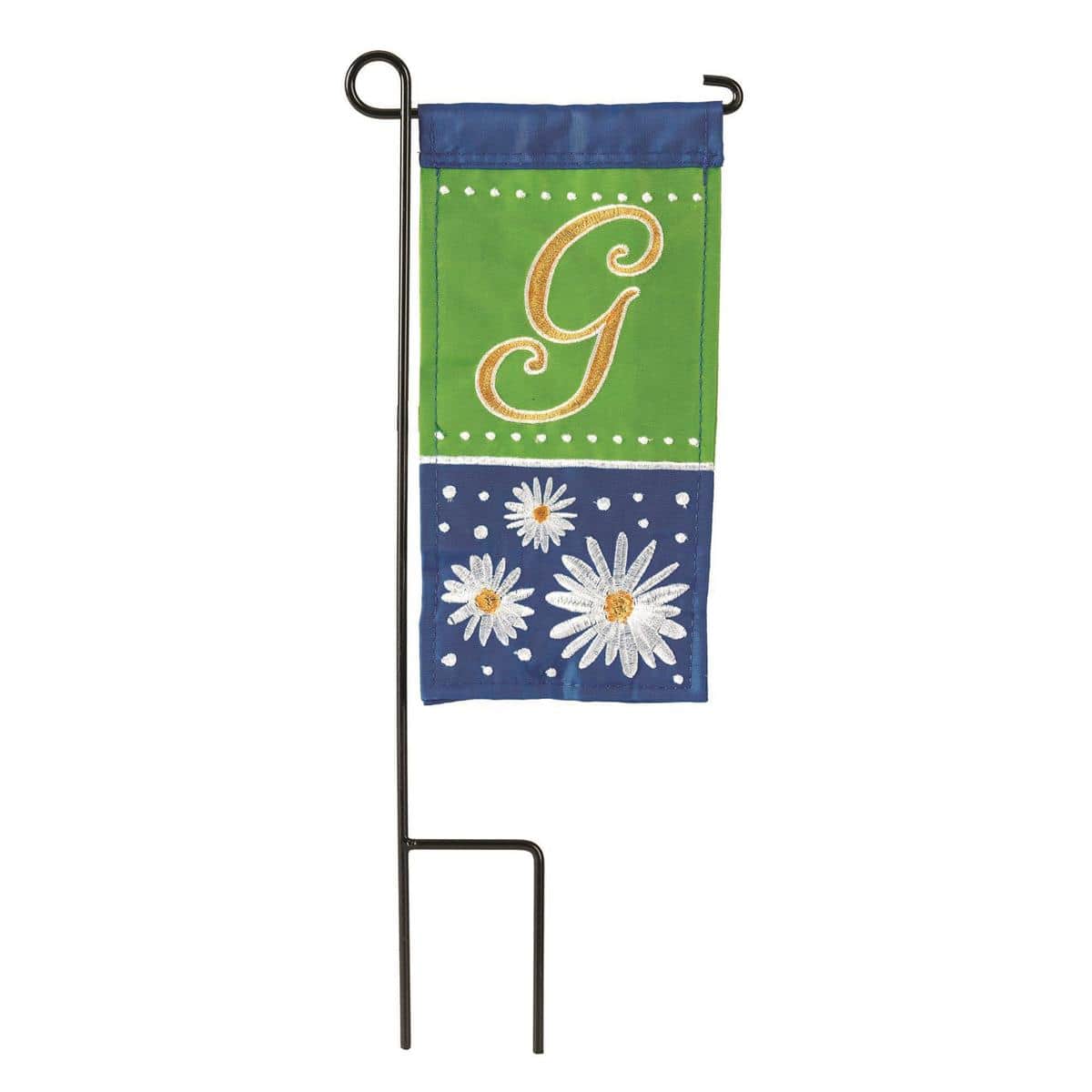 Close-up photo of the Mini Daisy Monogram-G 4x8 mini flag showing a bold letter G centered among white and yellow daisy blossoms on a soft pastel background, stitched hem and top sleeve visible for pole display.