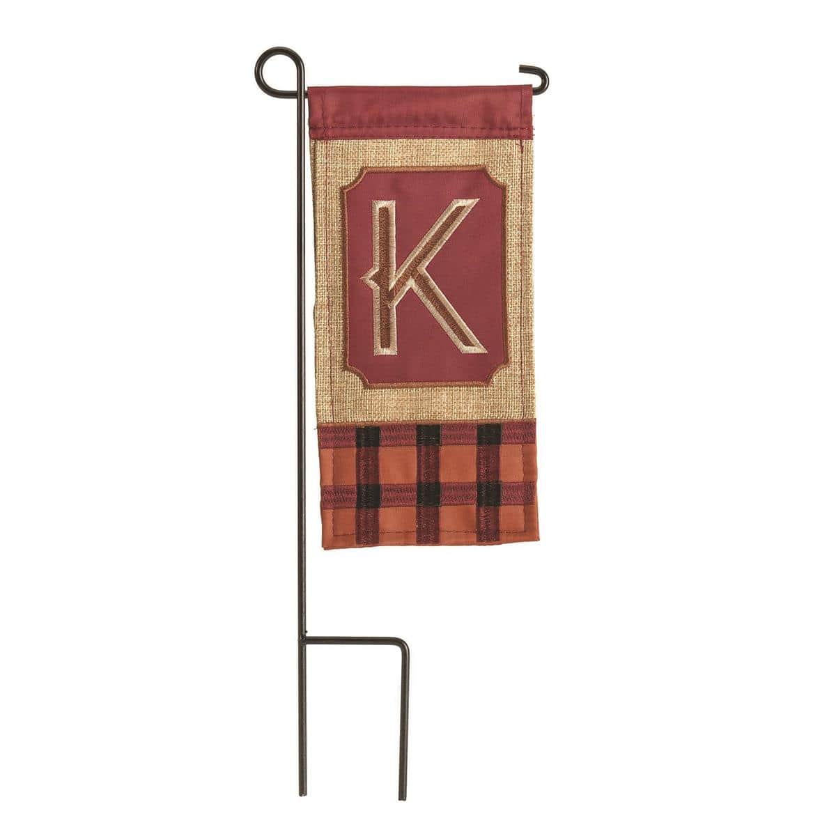 Mini Fall Burlap Monogram K mini flag in rustic harvest tones, 4 x 8 inches, displayed on a small garden stand by pumpkins and mums.