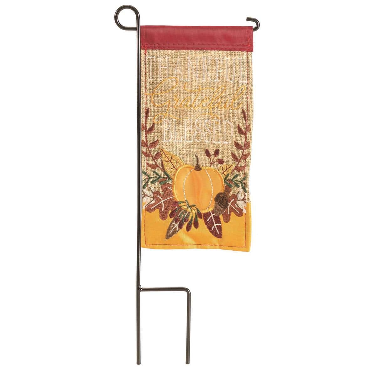 Mini Thankful Grateful 4x8-inch Thanksgiving mini flag with 'Thankful Grateful' text in warm autumn colors displayed on a small porch planter stake surrounded by fall leaves.