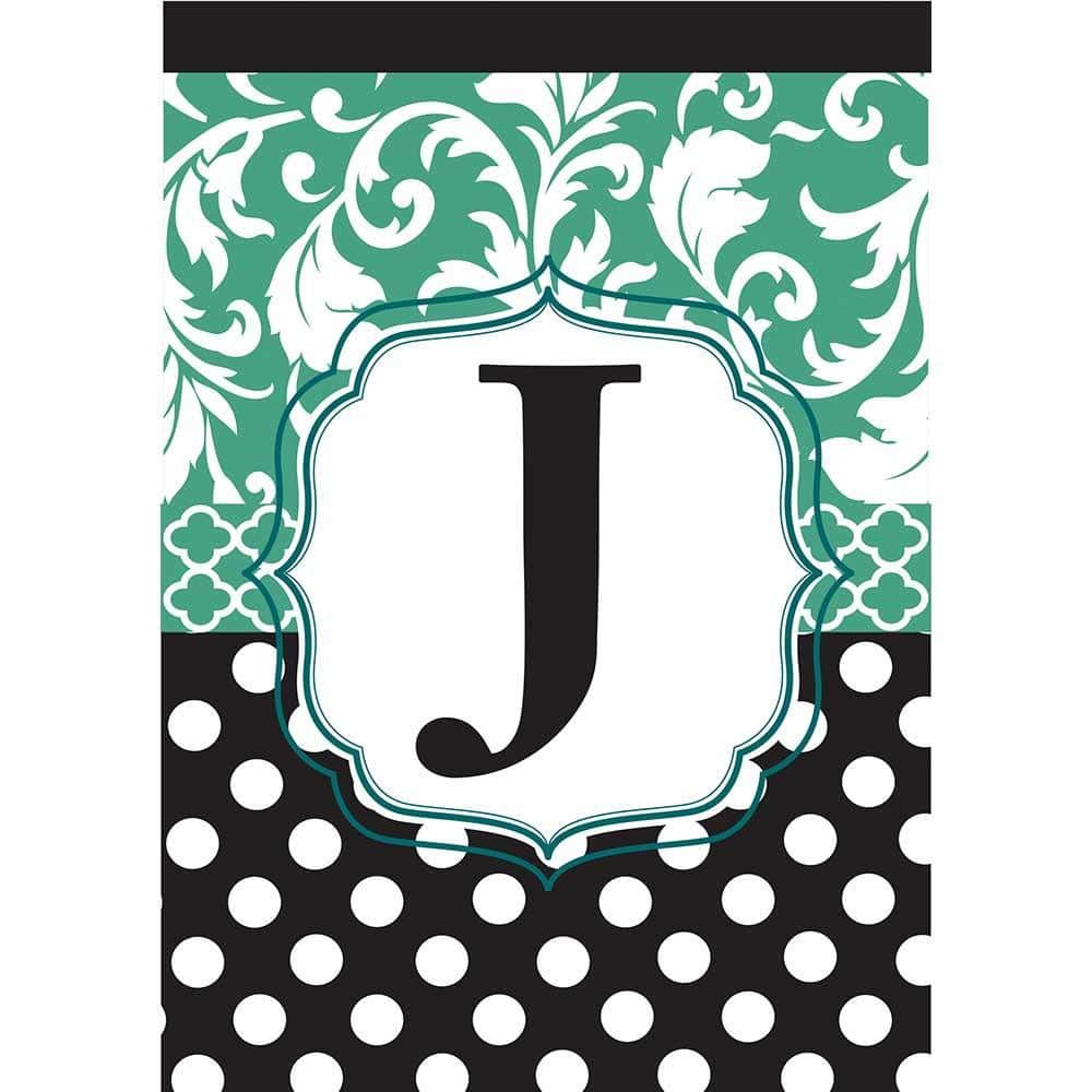 Close-up photo of Monogram-J double applique garden flag in black and aqua, 13x18 personalized initial design shown mounted on a garden pole in outdoor setting