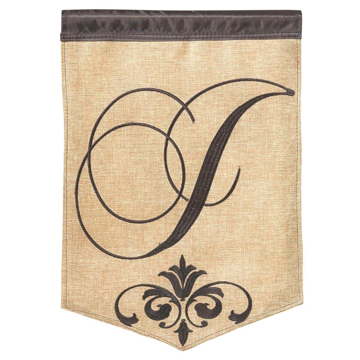 Close-up of 13x18 double applique burlap garden flag featuring the letter J in bold embroidery, natural poly-burlap texture, and a top pole sleeve ready to display.