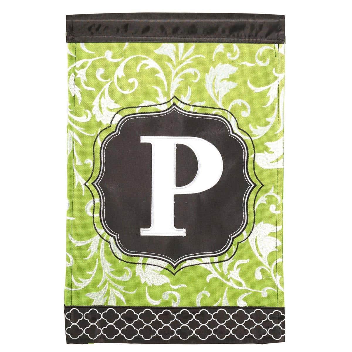 Green and black double applique 13x18 garden flag with bold letter P monogram on a stand by a front walkway, adding personalized outdoor style