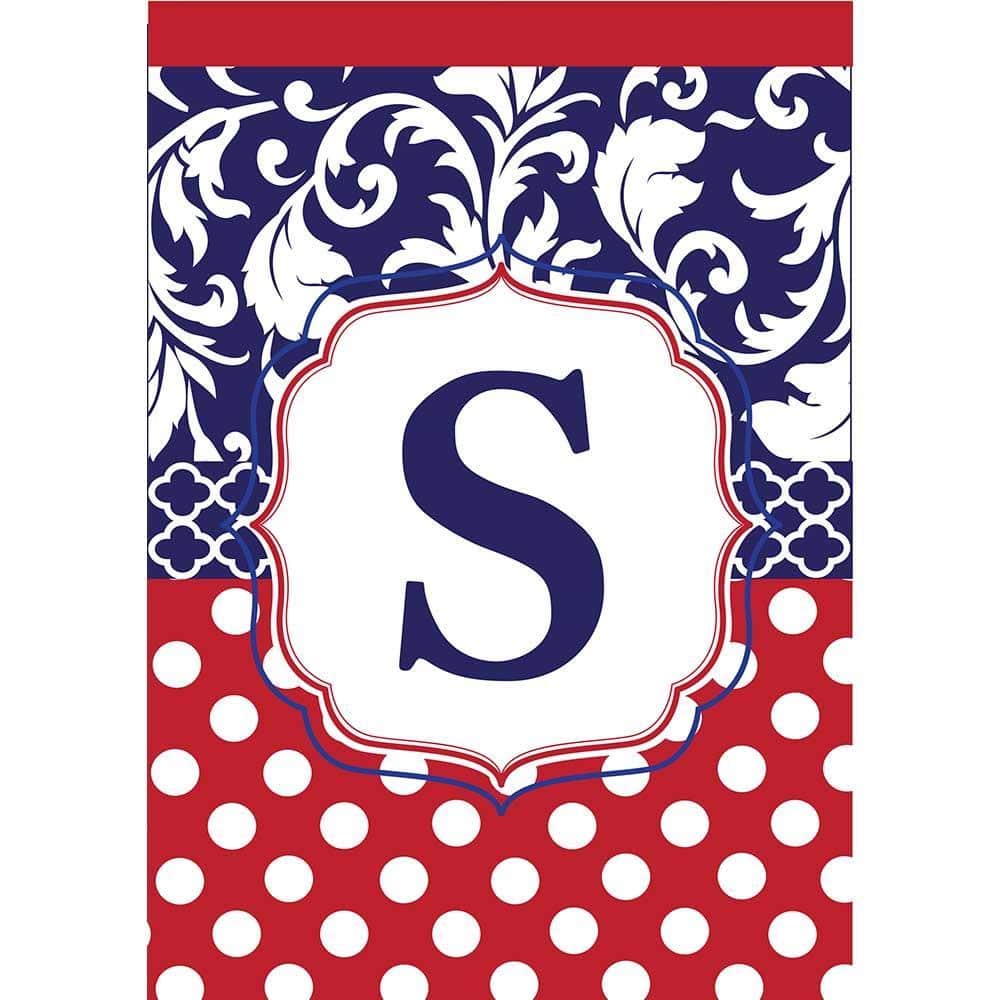 13x18 Monogram-S red white blue double applique garden flag with bold embroidered initial and reinforced sleeve hanging on a small metal yard flag stand in green lawn