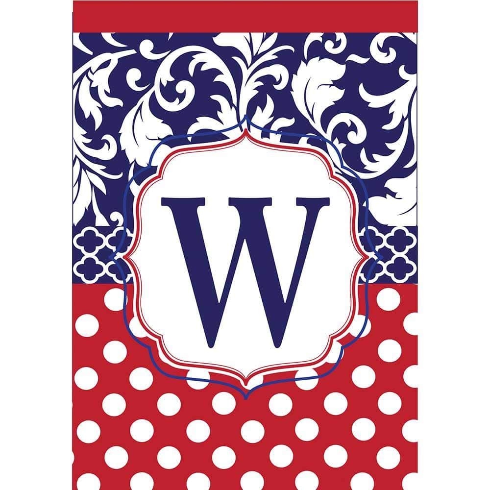 Alt text: 13x18 monogram garden flag with letter W in red white and blue double applique design displayed on a lawn pole near a walkway