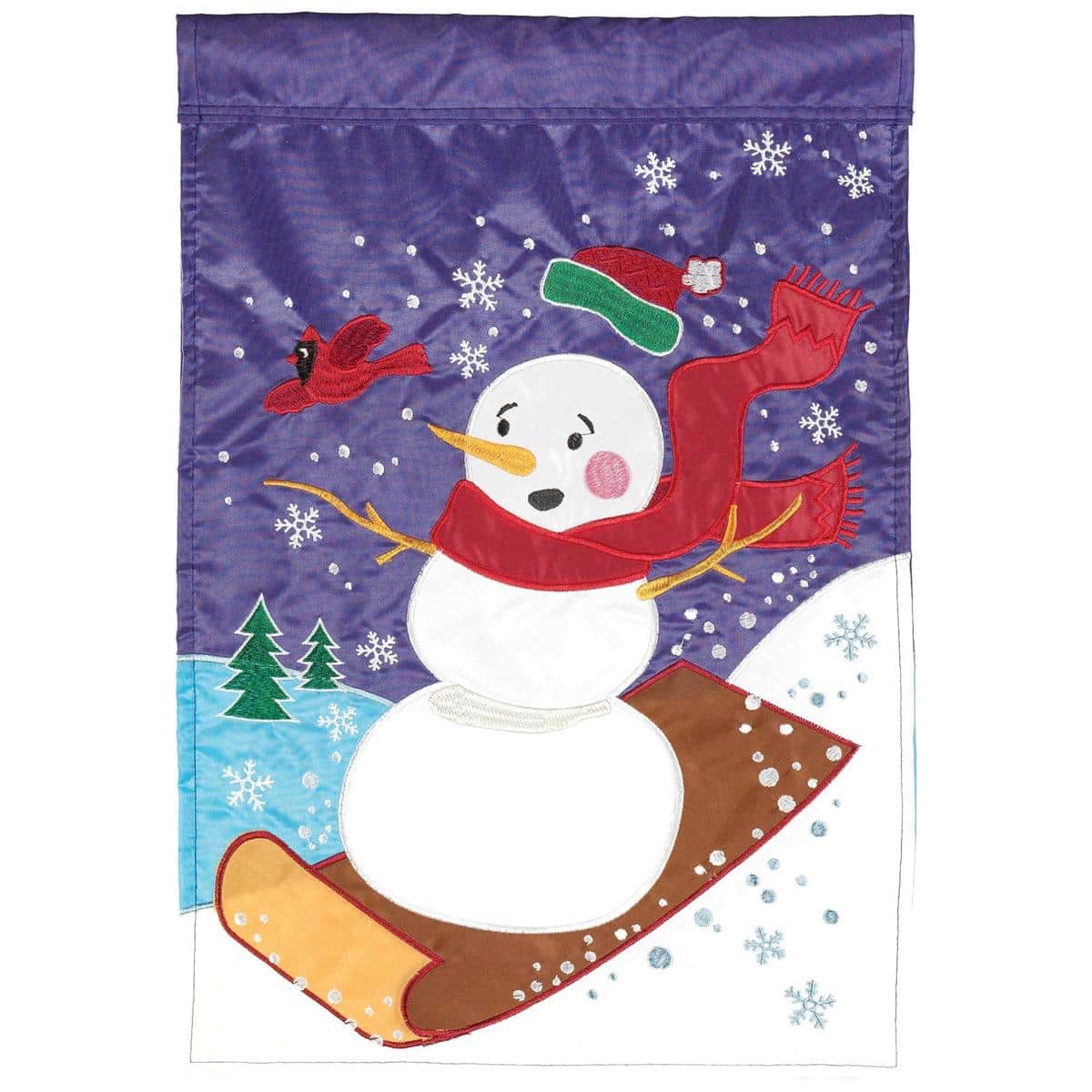 Christmas snowman sledding banner flag 29x42 with double applique scene of a happy snowman on a sled amid falling snow and evergreen accents, ideal for porch or garden holiday display.