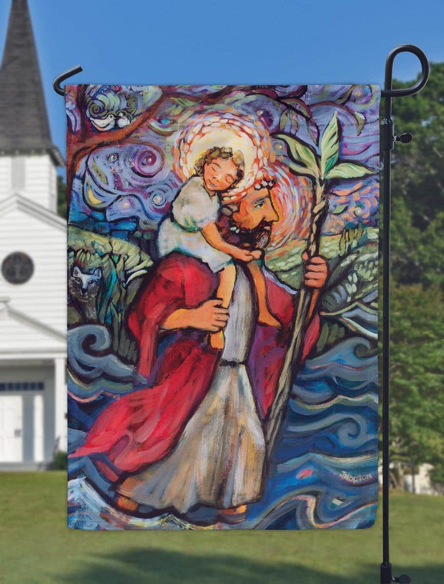 Printed 13x18 St Christopher garden flag showing Saint Christopher carrying the Christ child with decorative border, Catholic outdoor flag with clear saint image and hanging sleeve.