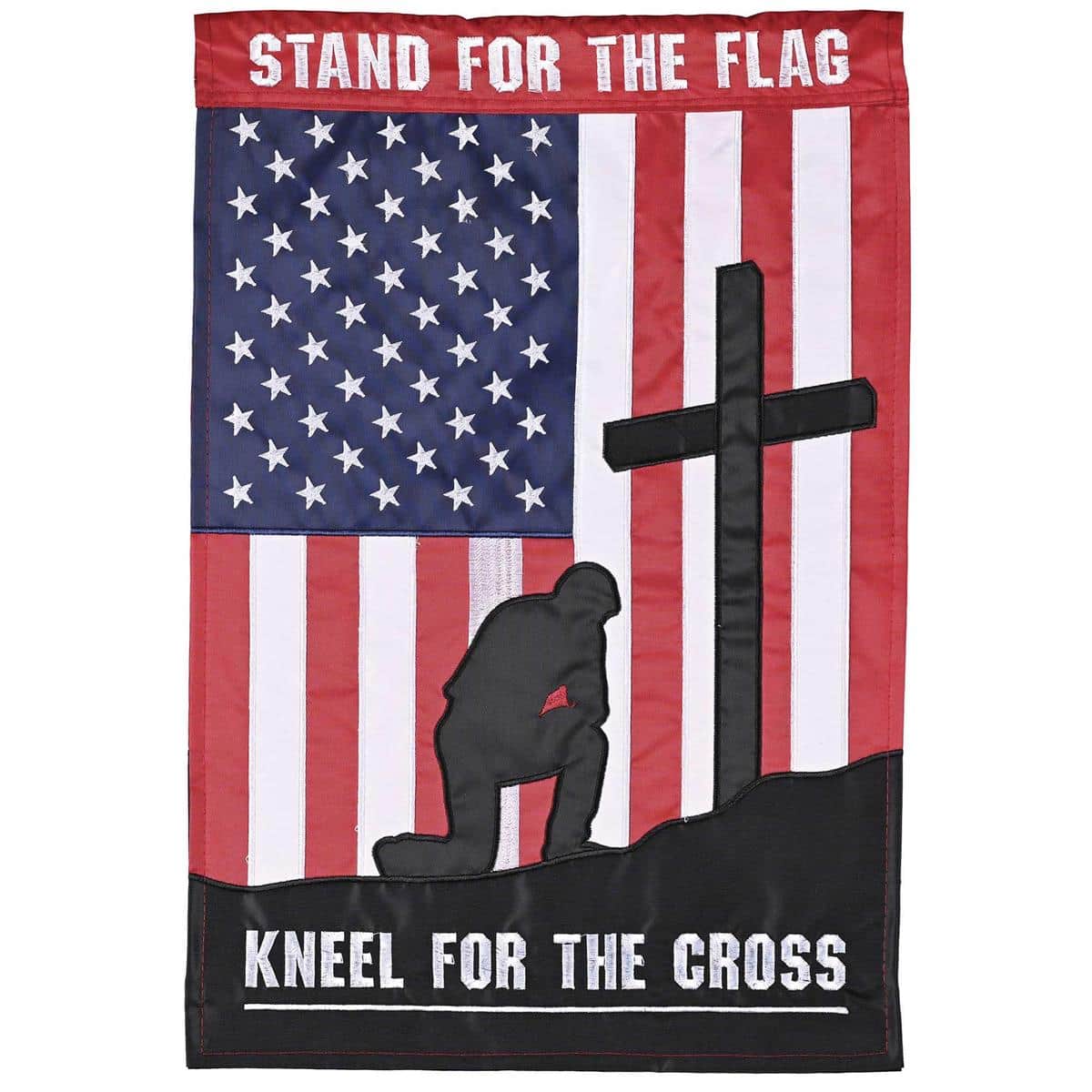 Double applique patriotic flag reading "Stand For The Kneel For" with embroidered stars and stripes on rich navy and red fabric, shown mounted on a porch flagpole in daytime light.
