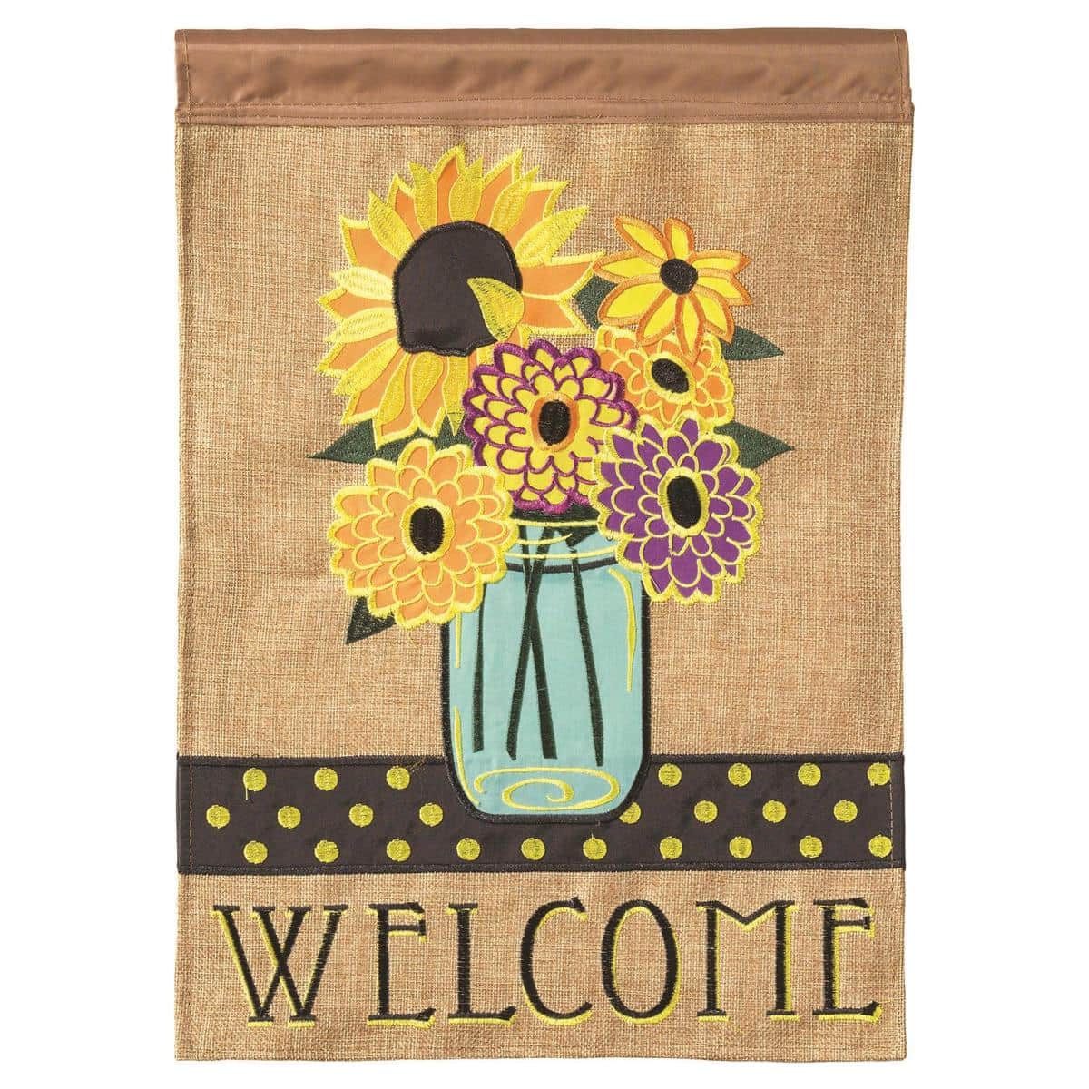 Double applique Summer Floral Welcome garden flag, 13x18 inches, layered floral appliques with stitched welcome greeting on a stand in a sunny front yard.
