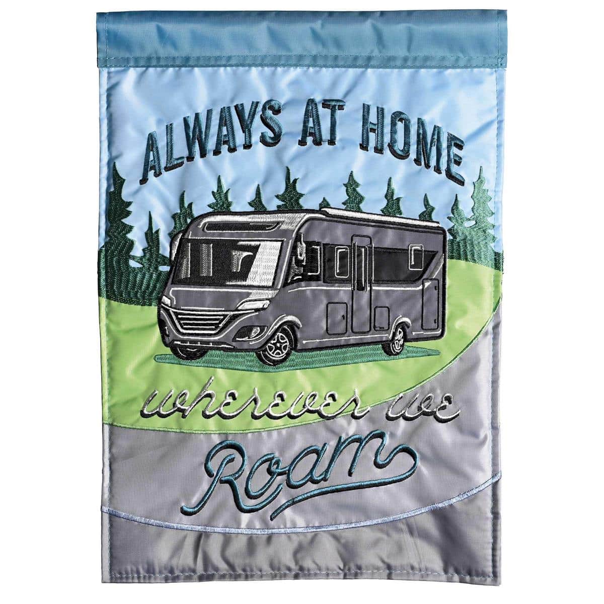 13x18 inch Summer Motorhome garden flag showing a double applique motorhome, pine trees, campfire, and sunny accents on durable fabric, hanging from a standard garden flag pole on a wooden porch stake.