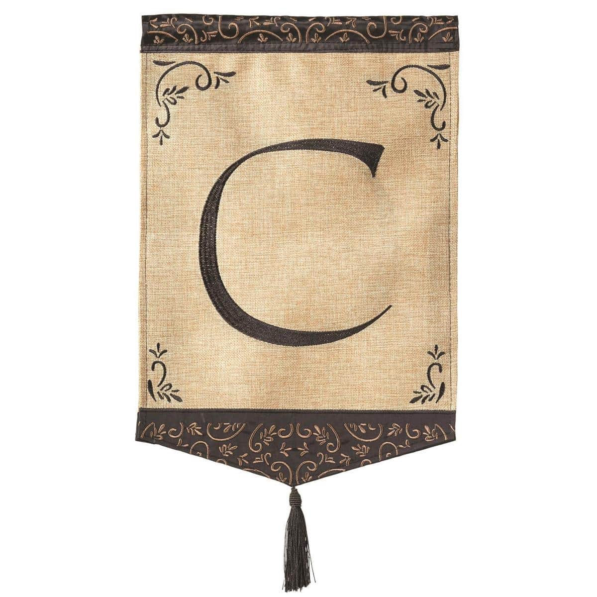 13x18 tassel burlap garden flag with embroidered monogram C, double applique layers, and tasseled bottom trim shown on a black metal garden flag pole against a neutral porch backdrop.