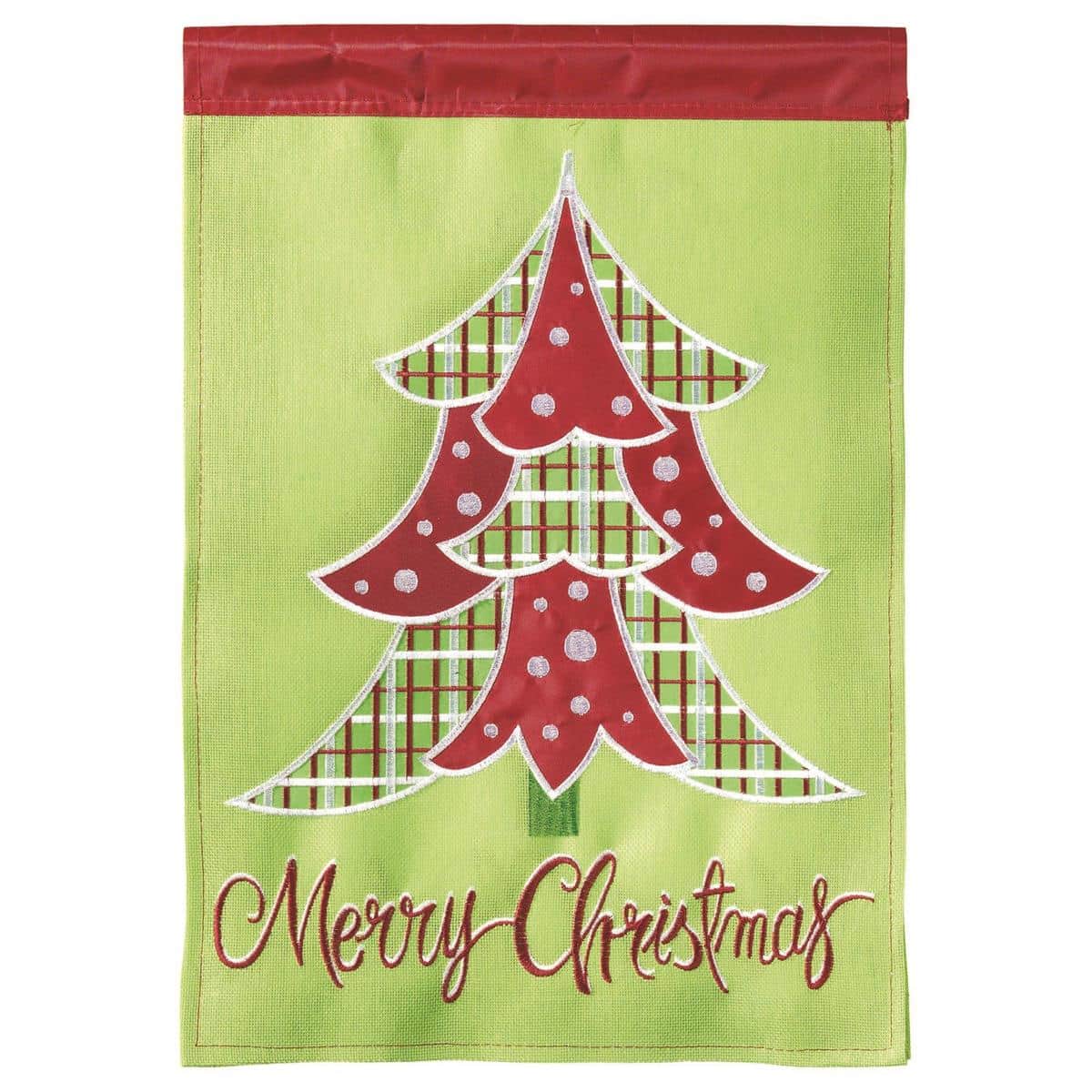 Close-up photo of a 13x18 burlap garden flag featuring a double applique Merry Christmas tree design with layered fabrics, visible stitching, and hemmed sleeve ready for pole display.