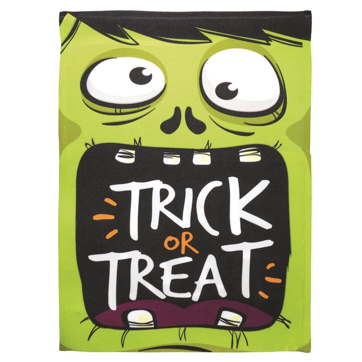 Printed Trick Or Treat garden flag 13x18 with smiling pumpkin, ghost, candy graphics and bold lettering displayed on a metal yard flag stand in a front yard.