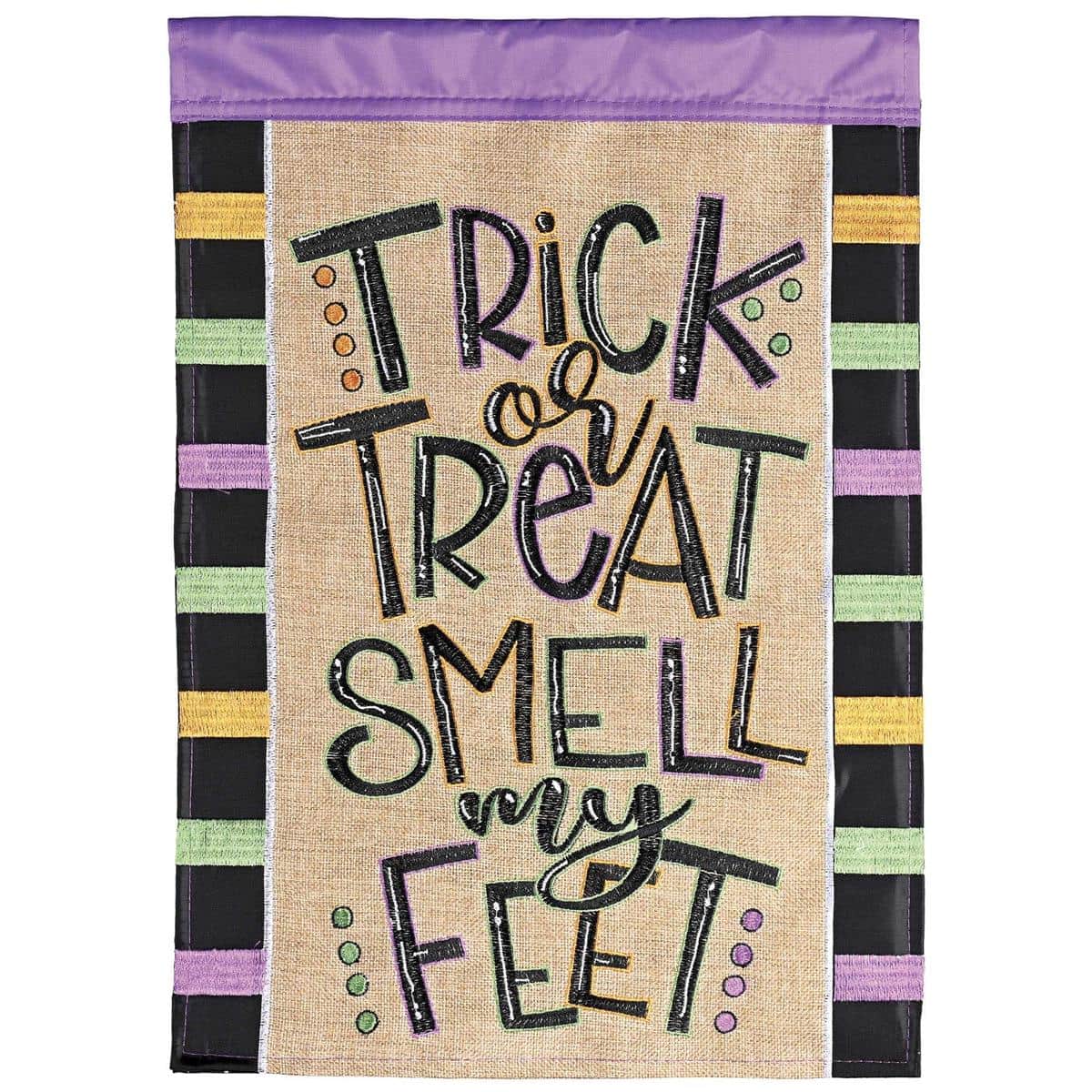 Double applique Trick Or Treat Smell My Feet 13x18 Halloween garden flag, vivid orange and black lettering, readable two sides, on a yard flag stand.