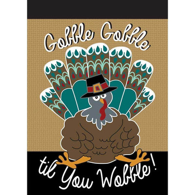 13x18 inch Turkey burlap garden flag with layered double applique turkey motif on rustic burlap background displayed on a metal garden flag stand in a fall porch scene