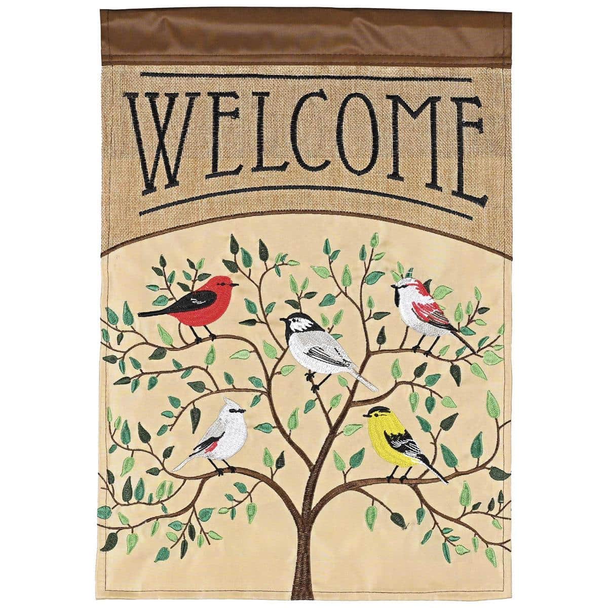 Colorful songbirds perched on a tree with a bold Welcome message on a layered double applique outdoor flag, hanging from a porch pole beside a garden path.