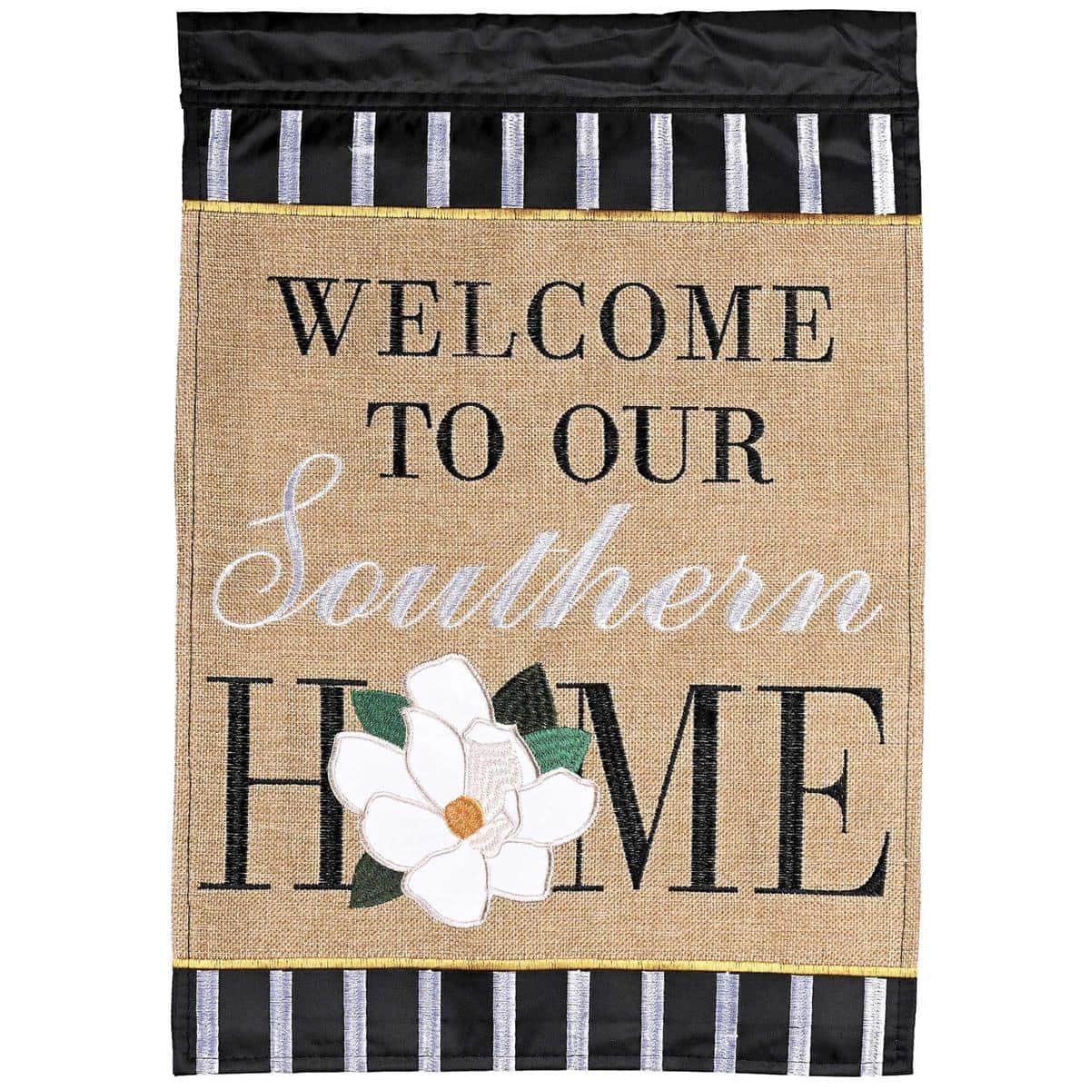 Closeup view of a 29x42 Welcome To Our Southern Home banner flag with double applique floral motifs and scripted welcome text hanging on a farmhouse porch pole with potted greenery.
